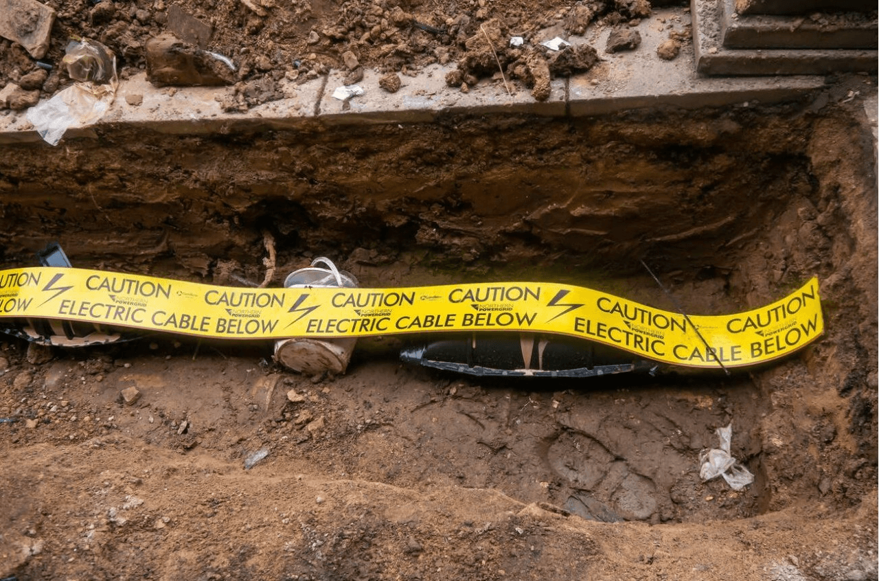 warning tape above the conduit
