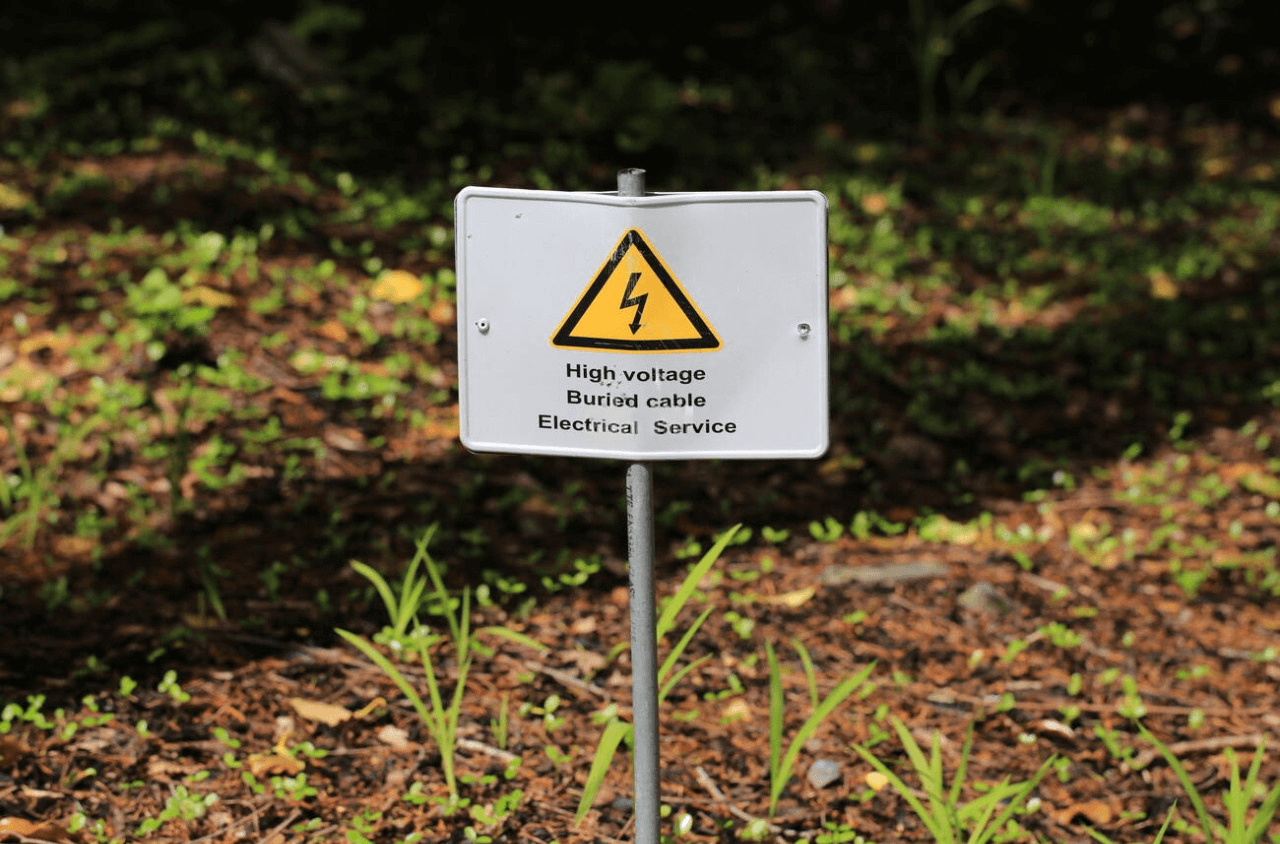 conduit buried and cables caution